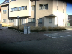 Aanleg tuin vooraan appartementsblok